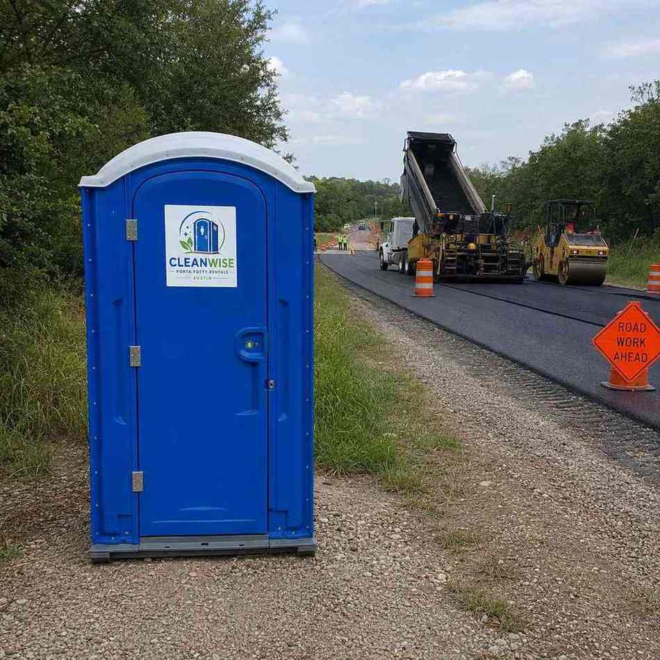Porta potty rental at an Austin road construction site